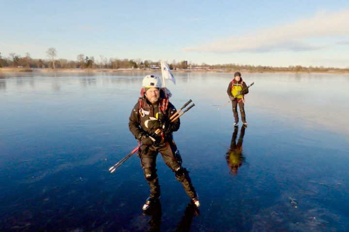 ice skaters on natural ice